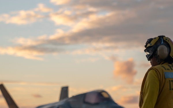 USS Tripoli Conducts Sunset Flight Operations