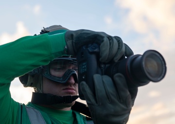 USS Tripoli Conducts Sunset Flight Operations