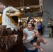 The AFN &quot;Eagle&quot; poses with AAFES patrons