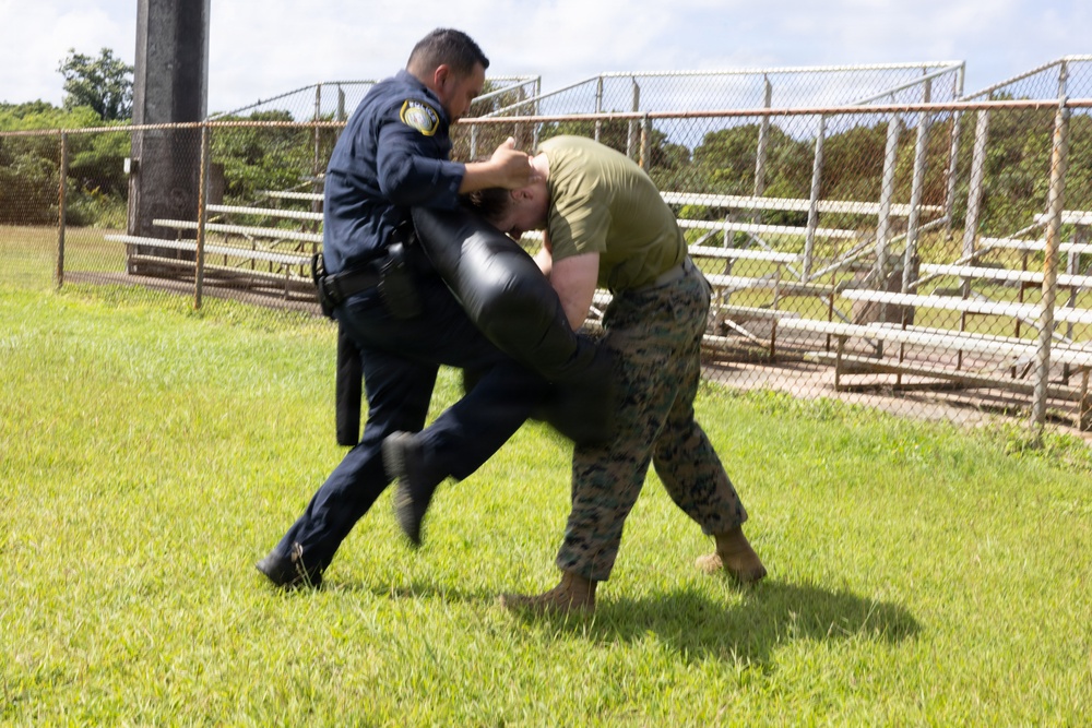 Camp Blaz Marines and Guam Police Officers conduct OC spray training