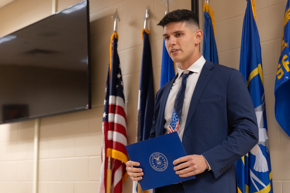 Kosovan recruit speaks at enlistment ceremony