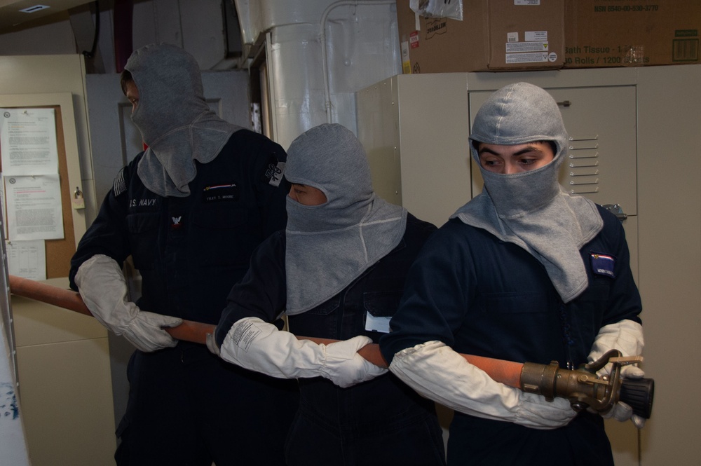 Ronald Reagan Sailors Practice 8010 Firefighting Drill