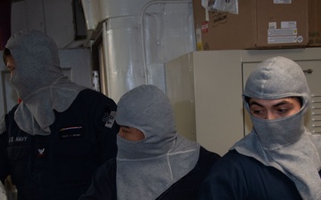 Ronald Reagan Sailors Practice 8010 Firefighting Drill