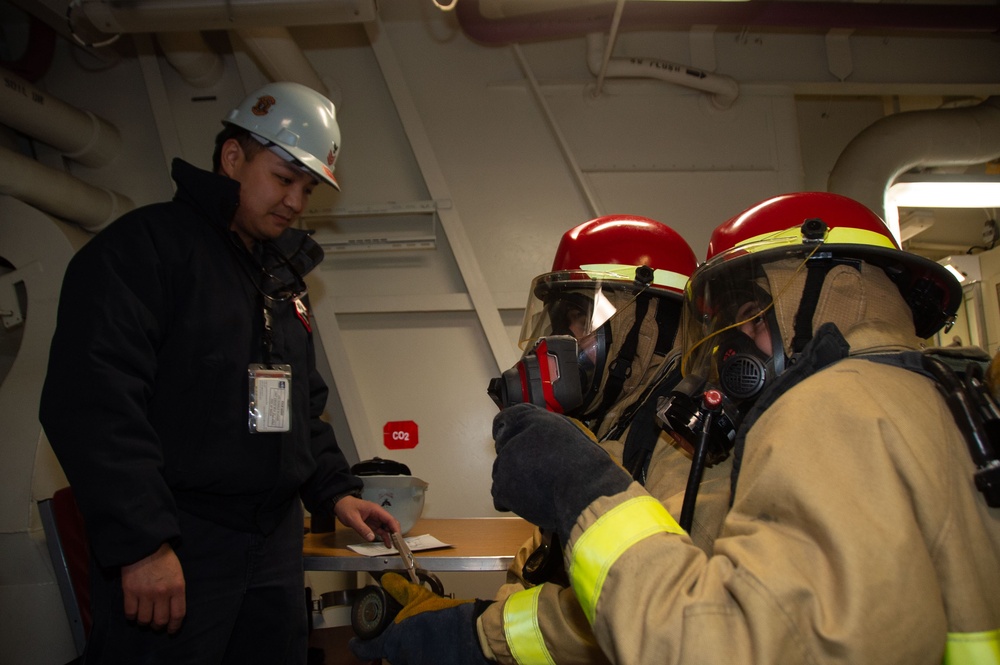 Ronald Reagan Sailors Practice 8010 Firefighting Drill