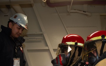 Ronald Reagan Sailors Practice 8010 Firefighting Drill