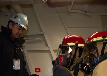 Ronald Reagan Sailors Practice 8010 Firefighting Drill