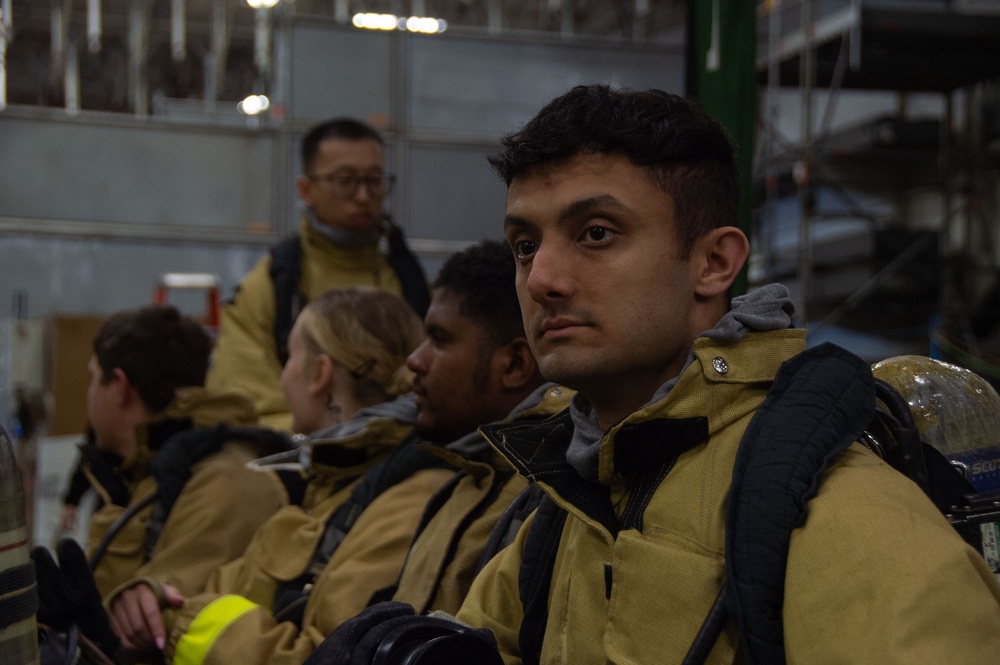 Ronald Reagan Sailors Practice 8010 Firefighting Drill