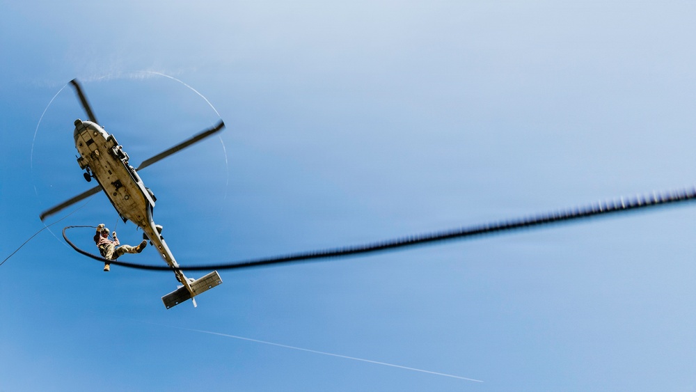 EOD Technicians Practice Daytime Rappelling and Fast-Roping Techniques