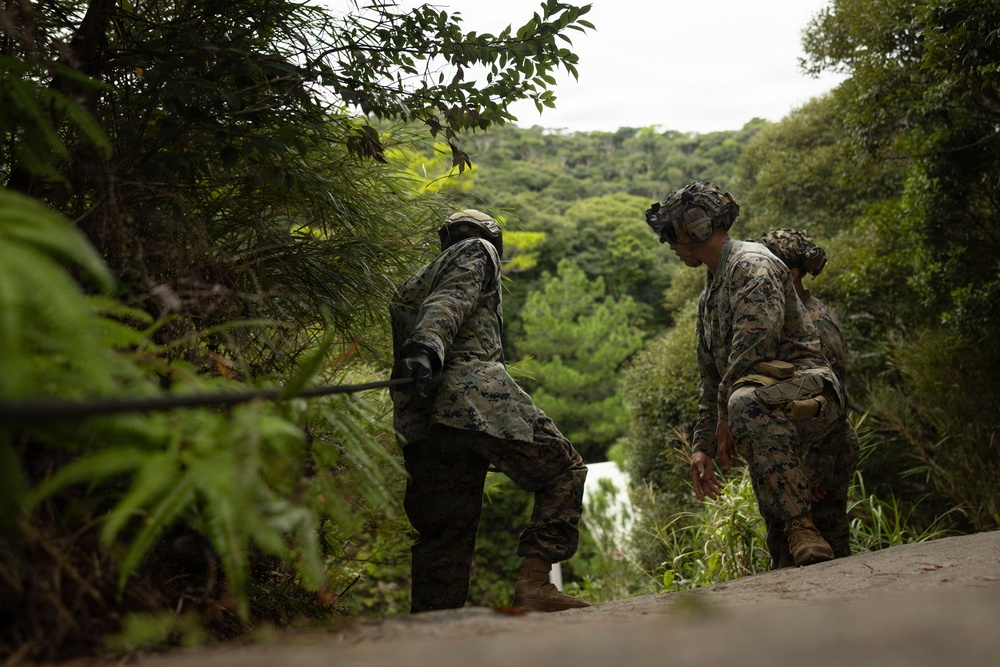 12th LCT Marines Rehearse Rappelling Techniques at JWTC