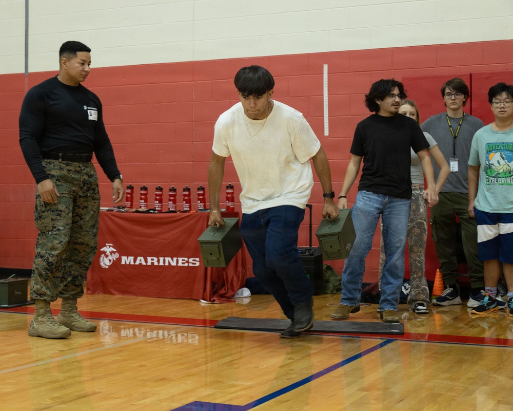 San Marcos Marines conducts physical training with Jack C. Hays High School students