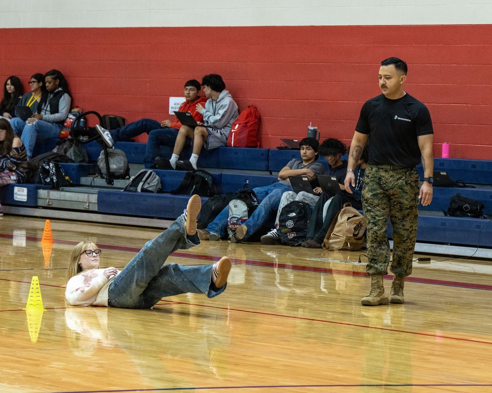 San Marcos Marines conducts physical training with Jack C. Hays High School students