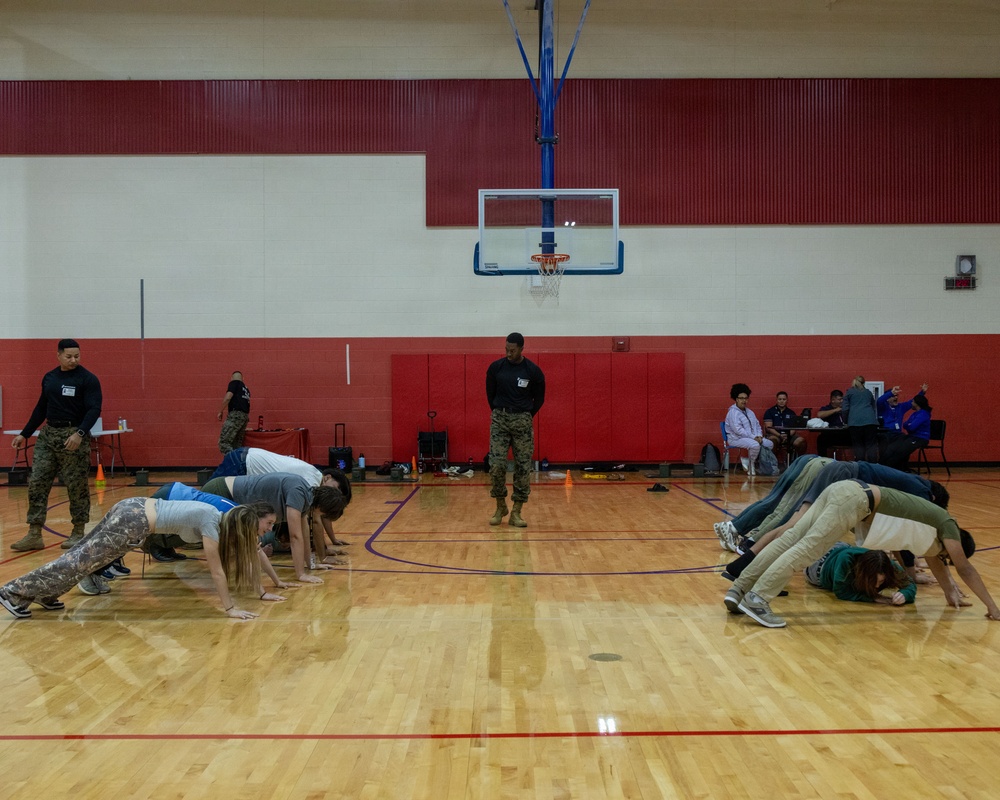 San Marcos Marines conducts physical training with Jack C. Hays High School students