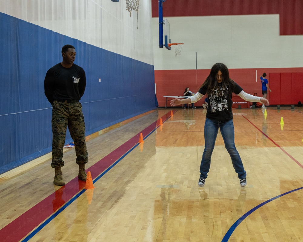 San Marcos Marines conducts physical training with Jack C. Hays High School students