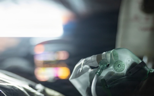 U.S. Navy Sailors alongside Finnish service members execute a simulated mass casualty response