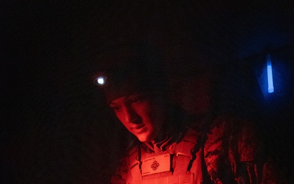 U.S. Navy Sailors alongside Finnish service members execute a simulated mass casualty response