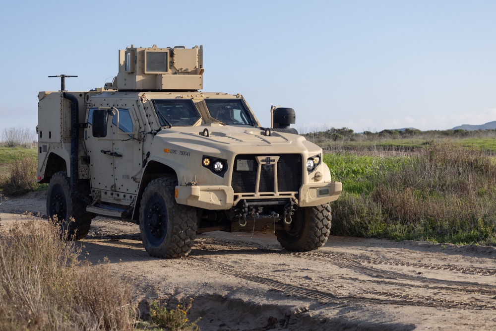 11th MEU Marines and Sailors embark equipment prior to a ship to shore movement