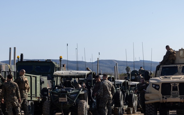 11th MEU Marines and Sailors embark equipment prior to a ship to shore movement