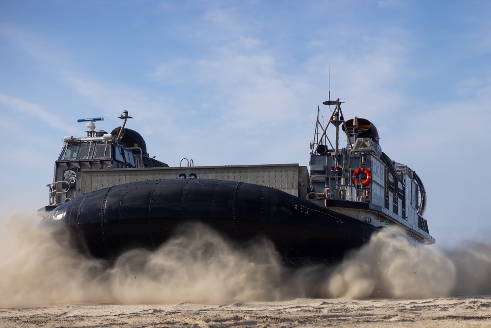 11th MEU Marines and Sailors embark equipment prior to a ship to shore movement