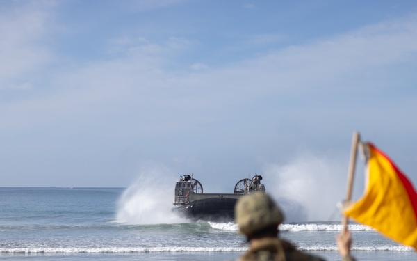 11th MEU Marines and Sailors embark equipment prior to a ship to shore movement