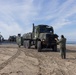 11th MEU Marines and Sailors embark equipment prior to a ship to shore movement