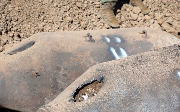 Two WWII-era training munitions rest in place after explosive ordnance disposal technicians safely vented and disabled them during a clearance operation on the Pueblo of Isleta, N.M.