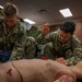 Sailors enrolled in the Hospital Corpsman Basic Course conduct combat lifesaver training.