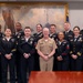 Adm. Daryl Caudle, Chief of Naval Operations, poses for a with the fiscal year 2025 Recruiter of the Year awardees during a visit to the Pentagon