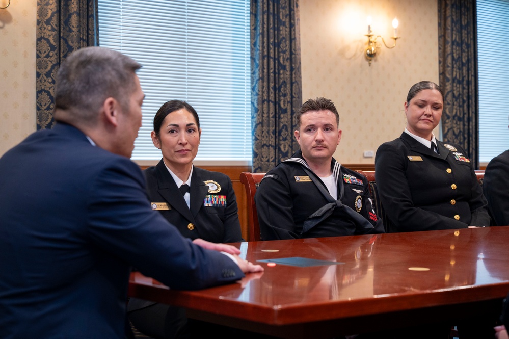 The Honorable Hung Cao, Under Secretary of the Navy, speaks with the fiscal year 2025 Recruiter of the Year awardees during a visit to the Pentagon