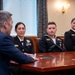 The Honorable Hung Cao, Under Secretary of the Navy, speaks with the fiscal year 2025 Recruiter of the Year awardees during a visit to the Pentagon
