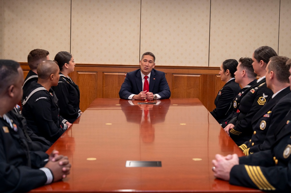 The Honorable Hung Cao, Under Secretary of the Navy, speaks with the fiscal year 2025 Recruiter of the Year awardees during a visit to the Pentagon