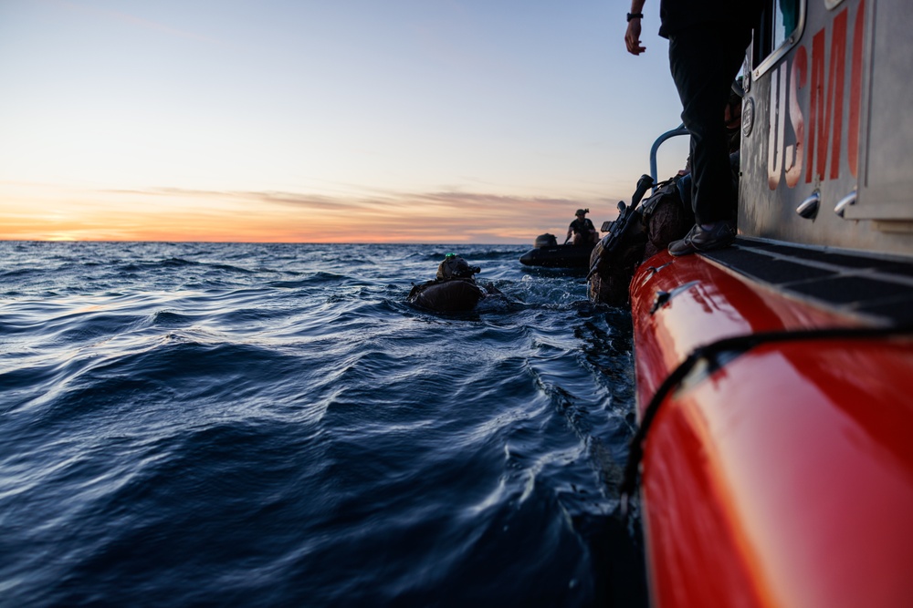 1st Recon Marines helocast from CH-53E Super Stallion during Steel Knight 25