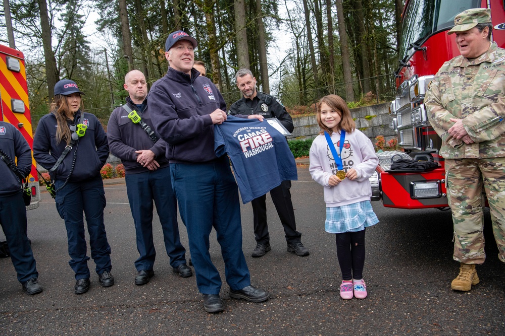Third-grader Shelbie McQueen from Camas, Washington, is recognized for her exceptional courage and quick thinking