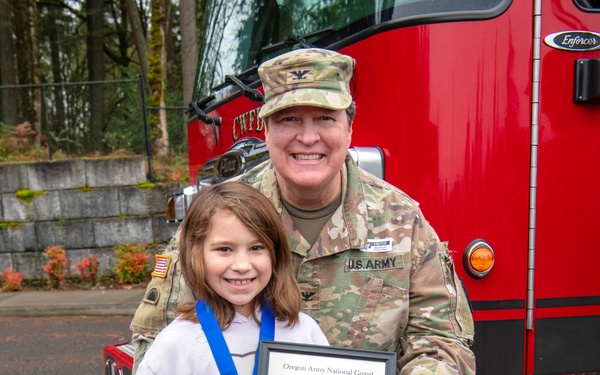 Third-grader Shelbie McQueen from Camas, Washington, is recognized for her exceptional courage and quick thinking