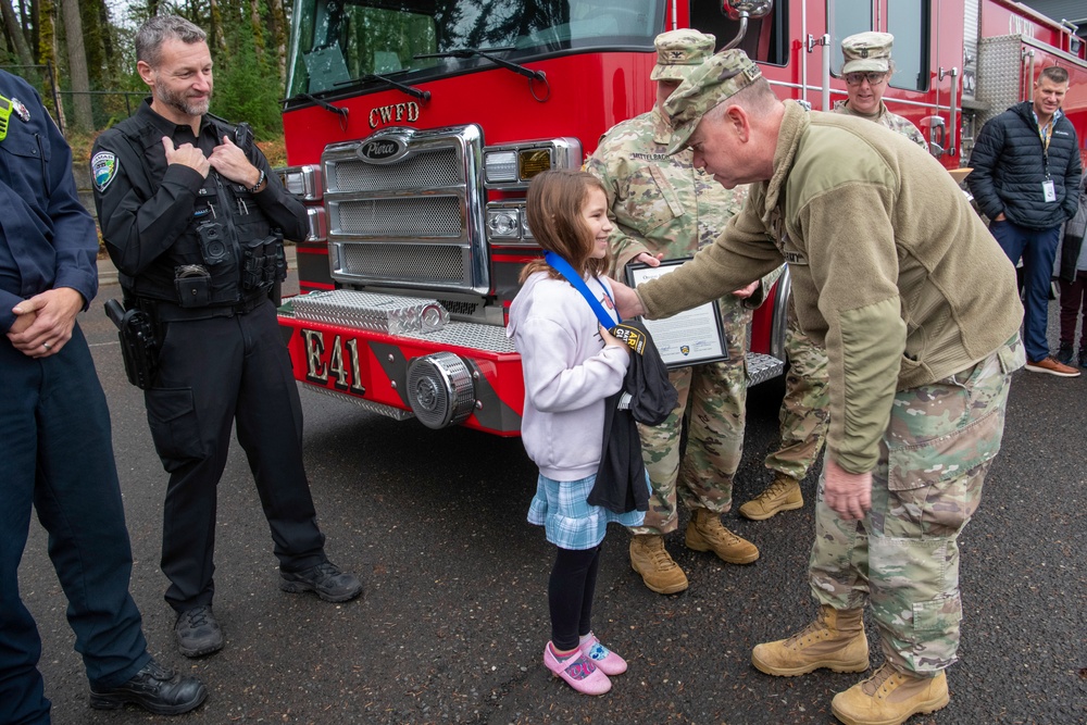 Third-grader Shelbie McQueen from Camas, Washington, is recognized for her exceptional courage and quick thinking
