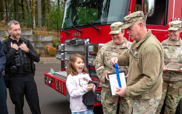 Third-grader Shelbie McQueen from Camas, Washington, is recognized for her exceptional courage and quick thinking
