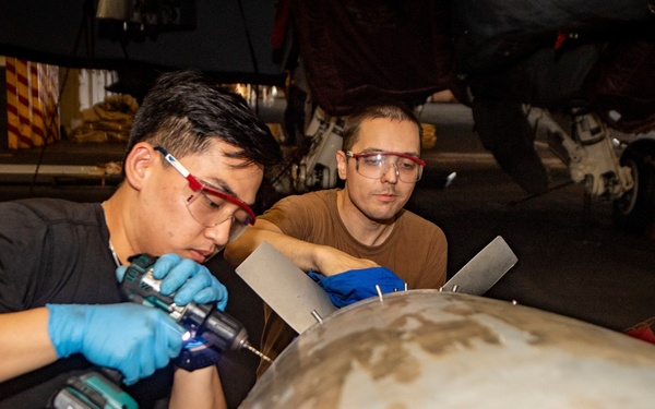 Nimitz Sailors Conduct Maintenance
