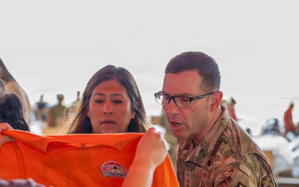 Distinguished visitors, global partners build bundles during OCD 25