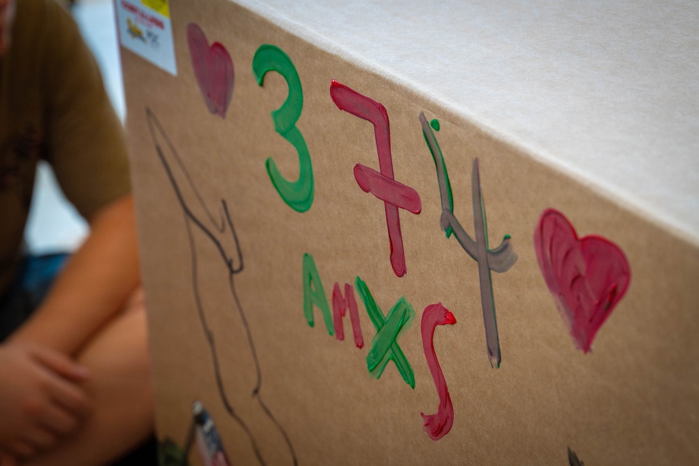 Service members, volunteers, families prepare bundles for OCD25