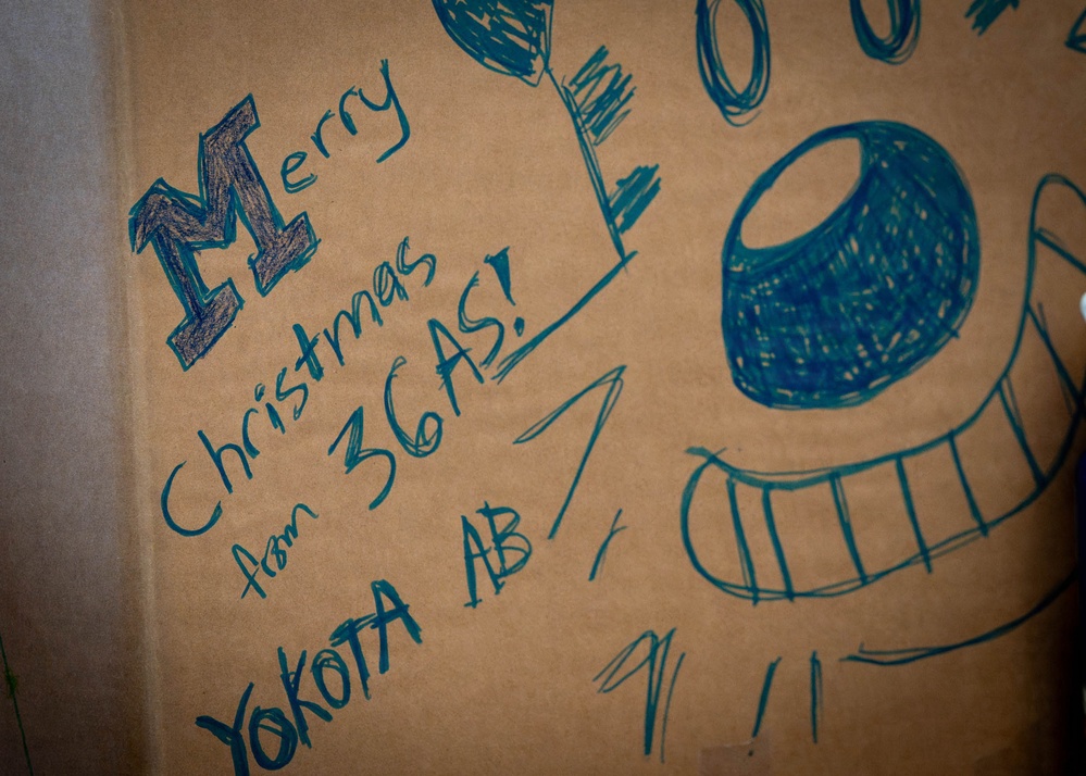 Service members, volunteers, families prepare bundles for OCD25