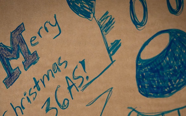 Service members, volunteers, families prepare bundles for OCD25