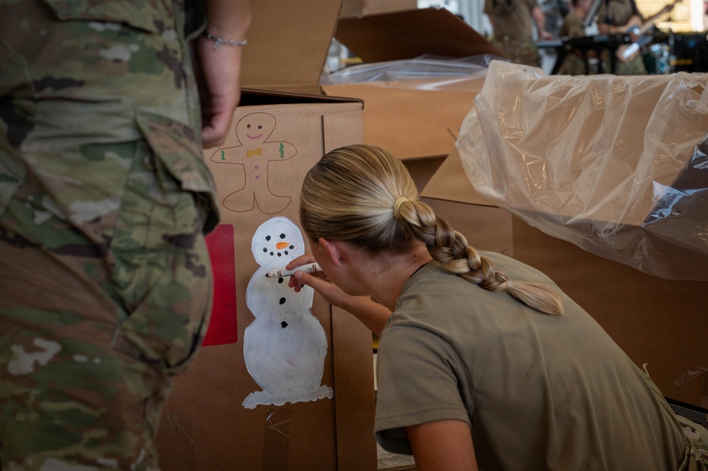 Service members, volunteers, families prepare bundles for OCD25