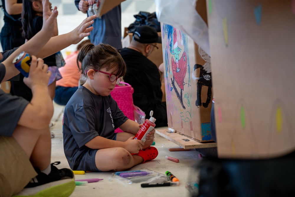 Service members, volunteers, families prepare bundles for OCD25