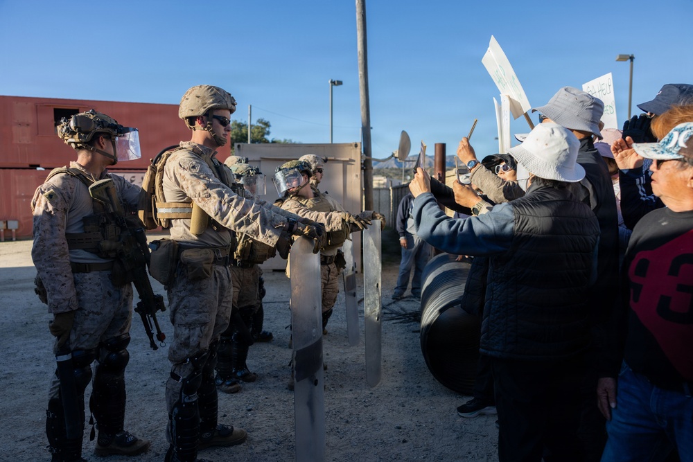 1st Bn., 5th Marines reinforces simulated embassy during Steel Knight 25