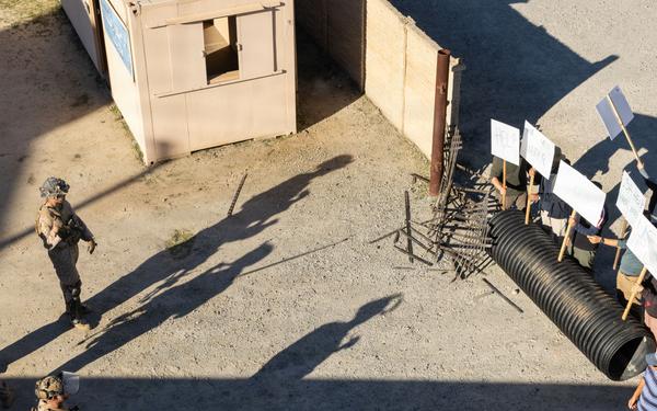 1st Bn., 5th Marines reinforces simulated embassy during Steel Knight 25