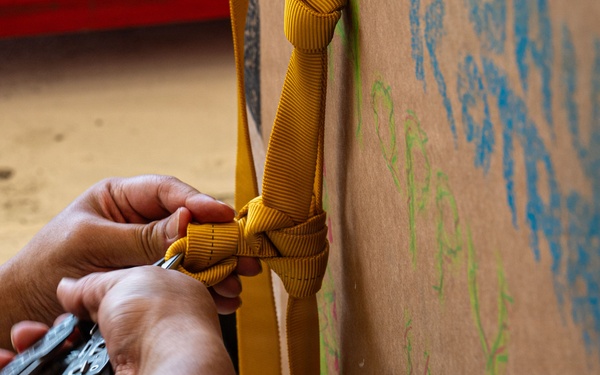 Wrapped up, packed up! 374 AEW readies bundles for OCD25 airdrops