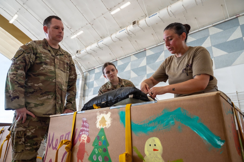 Wrapped up, packed up! 374 AEW readies bundles for OCD25 airdrops