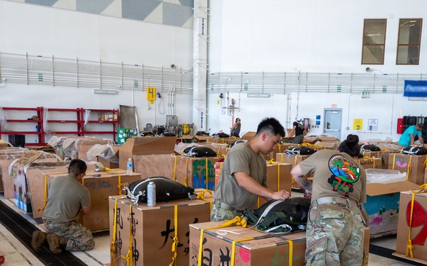 Wrapped up, packed up! 374 AEW readies bundles for OCD25 airdrops