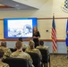 Marianne Martin speaks to 140th Wing