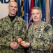 RADM Waters gives Bravo Zulu belt buckles to Chaplains