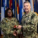 RADM Waters gives Bravo Zulu belt buckles to Chaplains